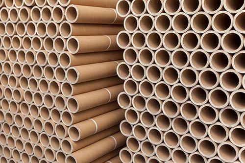 a stack of bunch of paper tubes