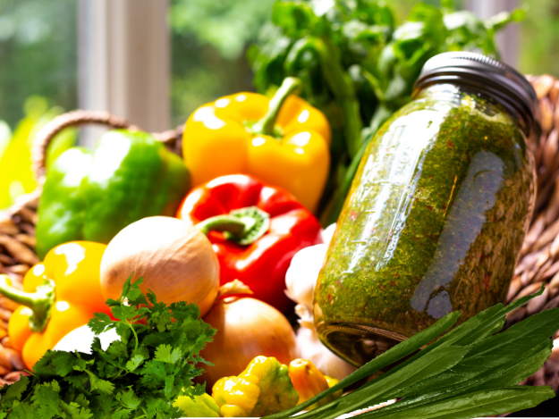 a jar of puerto rican sofrito with vegetables and herbs
