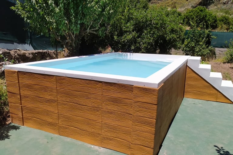 a wooden hot tub with a wooden deck and a pool