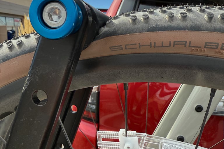 Close up of flat tire mounted on bike rack