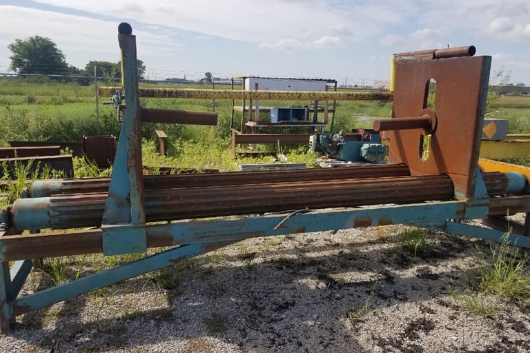 Old Used Rusted Wire Mesh Roller Payoff Table for rebuilding
