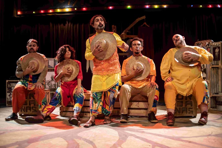 a group of people sitting on a stage