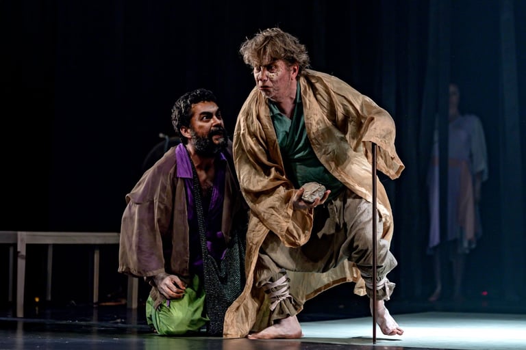 a man in a robe and a man in a robe