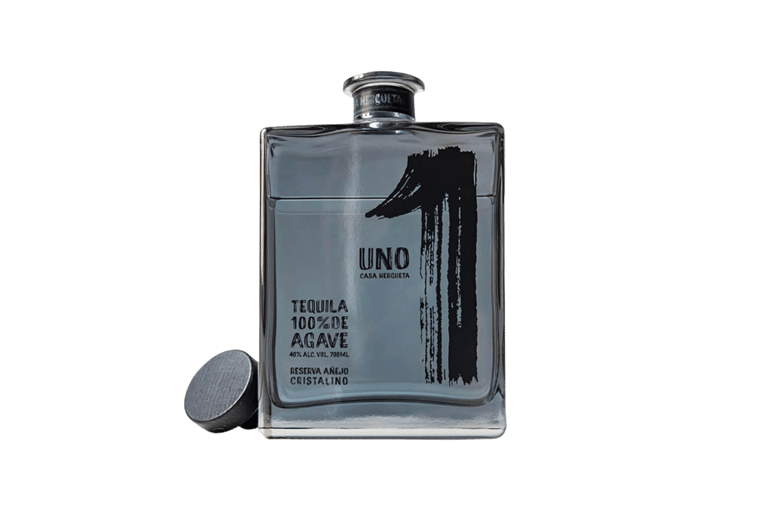 a bottle of uno tequila cristalino - premium tequila cristalino