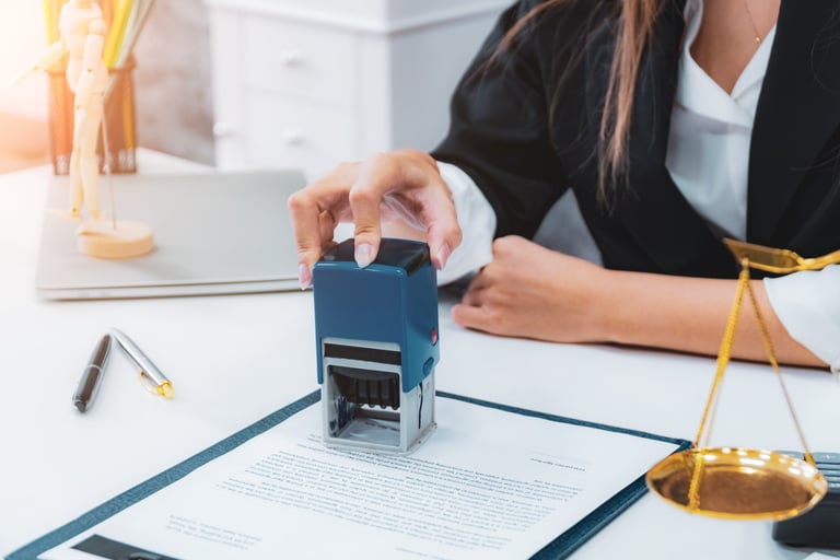 Mobile notary in Oregon applying notarization stamp.