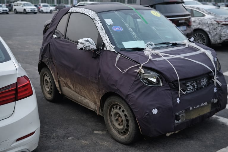 Smart #2 elétrico 2026 protótipo camuflado visto de frente lateral destacando novo modelo