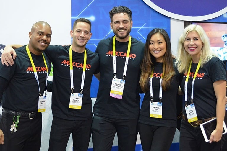 a smiling team of brand ambassadors poses together