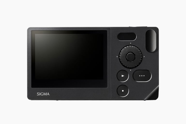 The Sigma BF Model Camera back view with buttons, dial, and screen.