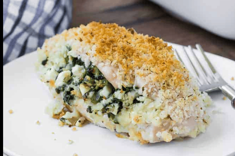 a plate with a piece of breaded chicken entreed