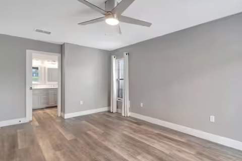 kingston home bedroom with new grey paint on the walls and new flooring