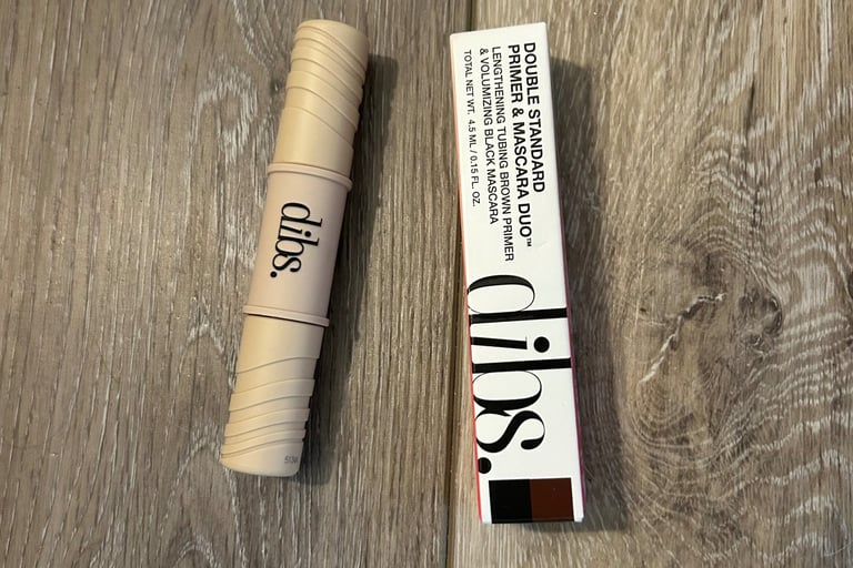 DIBS Mini Mascara & Primer Duo on marble background.