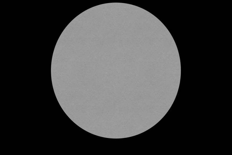 Grey dot on a black background