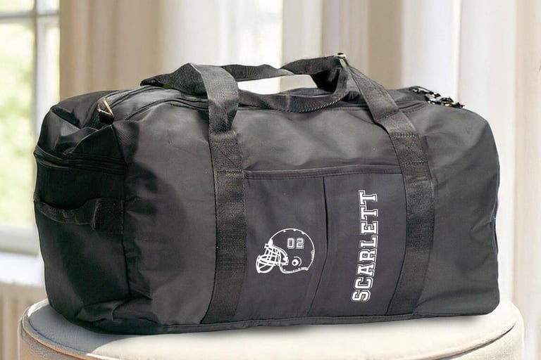 a duffel bag with a helmet on it