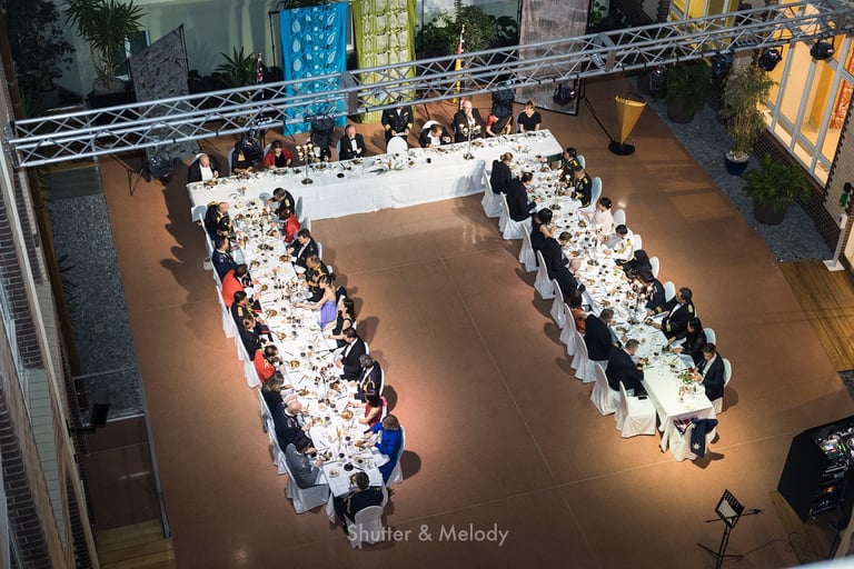 A photograph of the tables at the Navy dinner from the top.