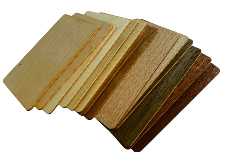 A stack of NFC card made of various wood colors and texture