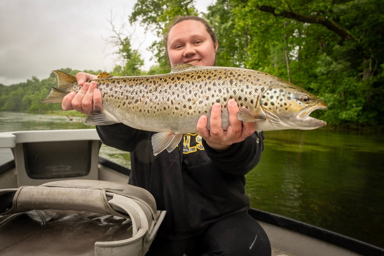 Kayla caught a new personal best while on.a guided trip with the South Holston Angler.