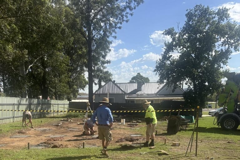 Cementing the temporary church site foundations