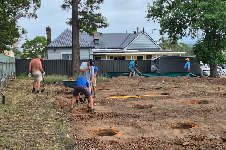 Digging holes for the temporary church site