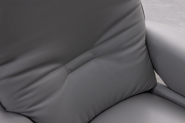 a chair with a pillow on it
