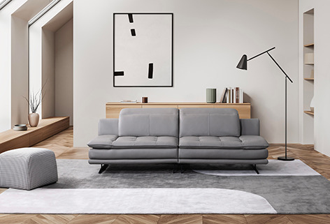 a living room with a couch and a chair