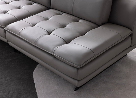 a couch with a large couch and a rug