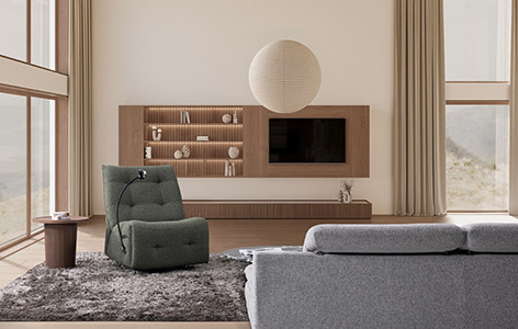 a living room with a couch and a chair