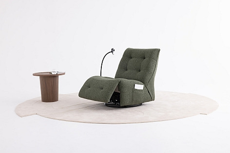 a chair with a chair and a table with a table with a lamp