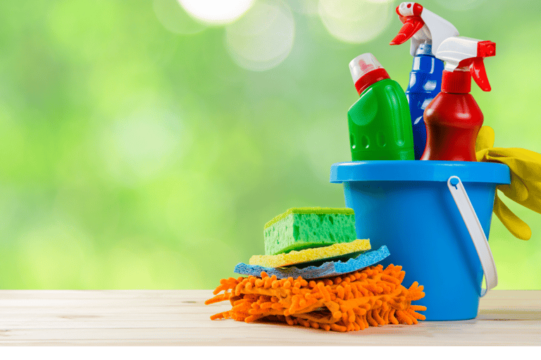 Cleaning supplies in a blue bucket