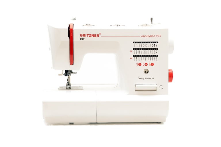 a sewing machine with a white background