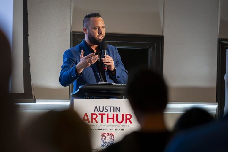 Austin Arthur at podium, Orange County Commissioner District 1 campaign, West Orange County