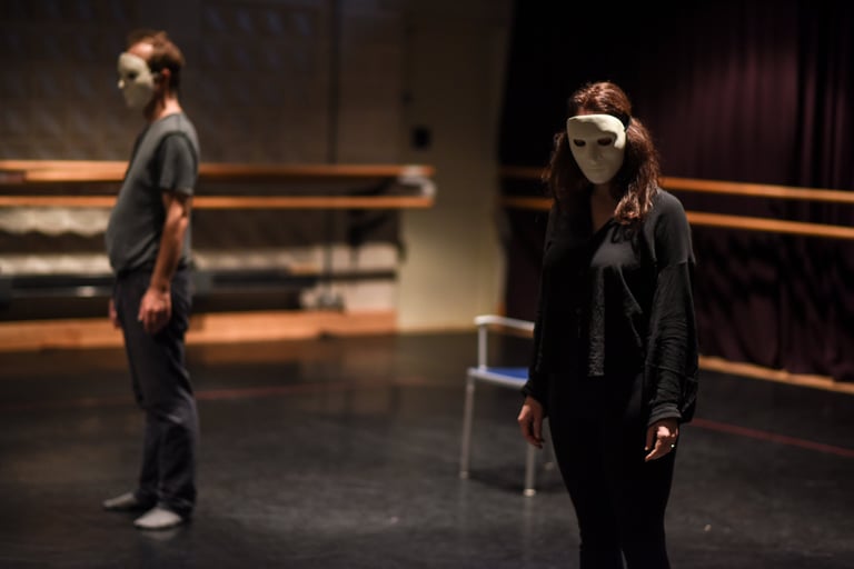 two actors in neutral masks at a 'feldenkrais for actors' workshop