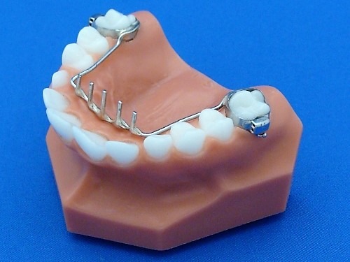 a image showing rake thumb sucking appliance