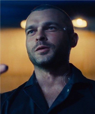 a man with piercings on his forehead