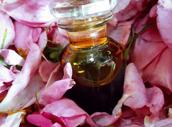 Perfume flask with rose petals