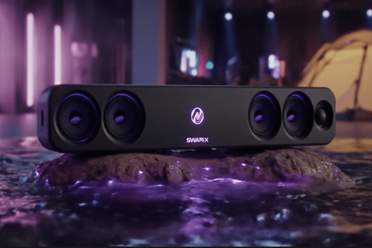 Swarix soundbar with purple glow in pool setup