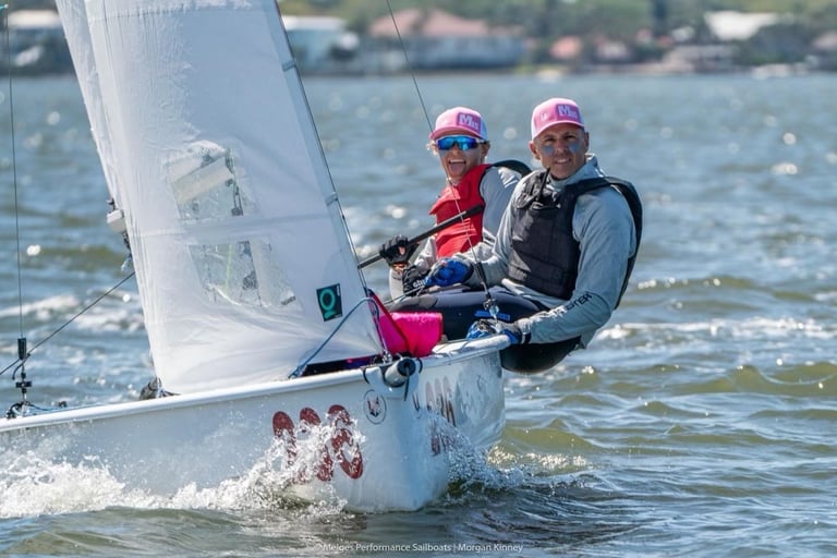 Maija Andert sailing the Melges 15 with dad crewing
