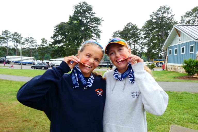 Maija and Anna showing off their bronze medals at SE Regionals