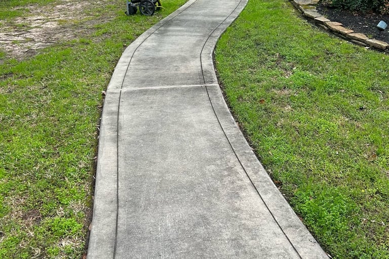 Sidewalk before pressure washing