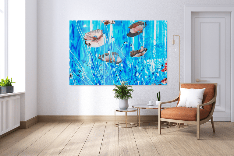 Canvas with poppies on it hanging on wall with chair and table in a minimalist livingroom 