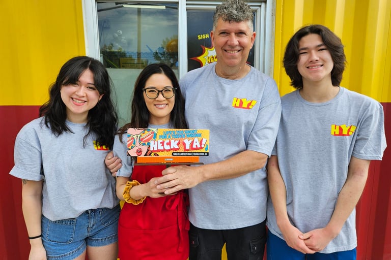 HeckYA owners Billy & Yukari West with kids at their Youngstown Ohio drive-through restaurant