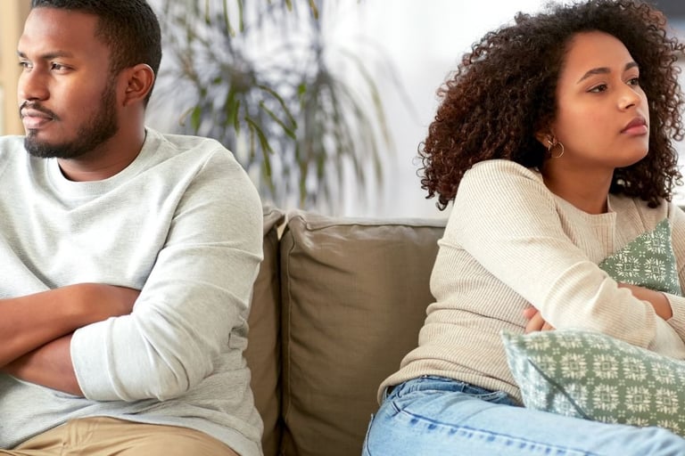 Couple in conflict turned away from each other