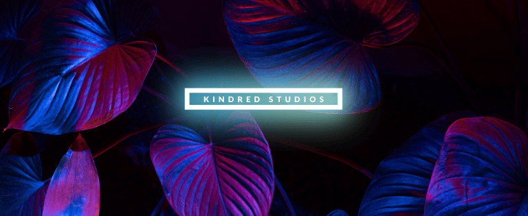 Plant background, with glow text saying Kindred Studios