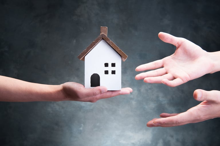Someone Offering Home to Two Outstretched Hands