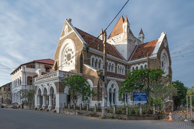 a large building with a clock tower and a clock tower