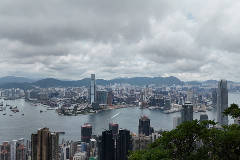 a view of a city skyline with a view of a city Hong kong