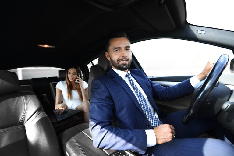 Chauffeur driving JAX airport transportation car