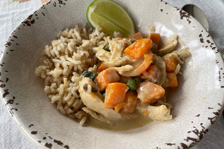 sweet potato and chicken curry with brown rice and lime