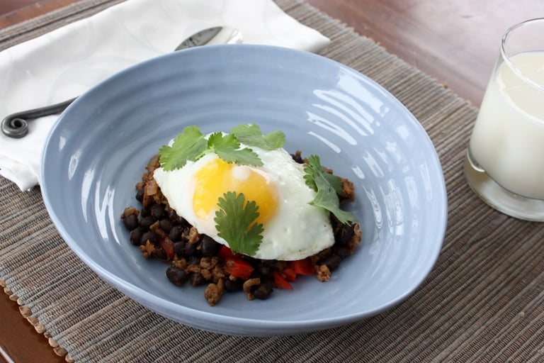 taco breakfast bowl with runny egg