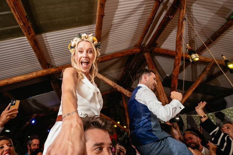 a bride and groomsmid dancing at a wedding happy they chose the right photographer