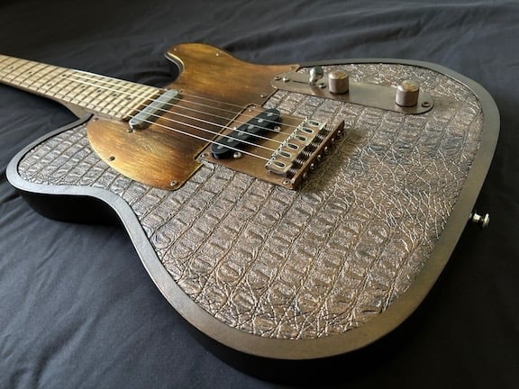 Sobek's Tele Telecaster style dark industrial guitar. Angle front view.